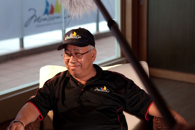 Monsoon Cup chairman Tan Sri Sabbaruddin gives a television interview on day 2 of the Malaysian Match Racing Championships 2009. Kuala Terengganu, Malaysia. 24 November 2009. Photo: Gareth Cooke/Subzero Images © Gareth Cooke Subzero Images/Monsoon Cup http://www.monsooncup.com.my